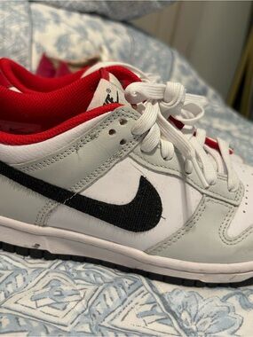 Nike dunks. Red, white, black, gray.